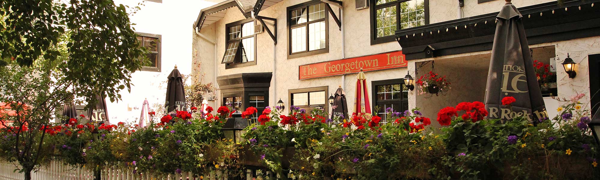 The Georgetown Inns patio and garden in summer.