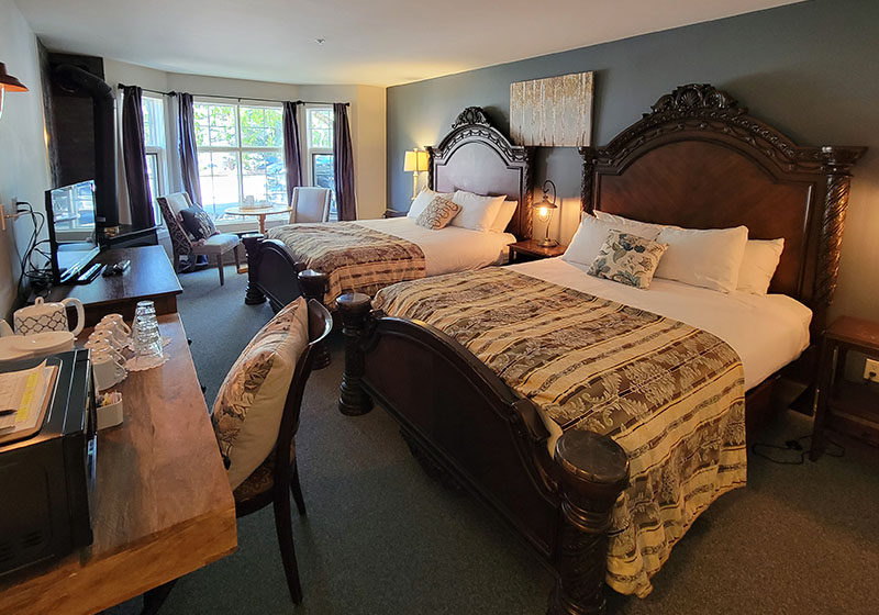 The large 2 queen bedroom in our Tudor Suite.